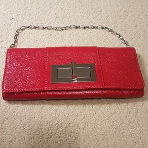Ruby red leather clutch and shoulder bag